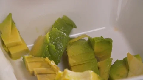 Chef cuts vegetables, peppers, tomato, avocado, healthy food Stock Footage 116685633