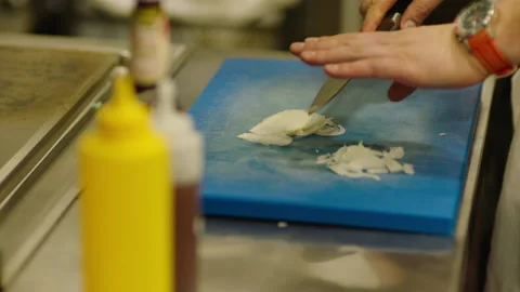The chef cuts vegetables professionally. Professional cooking Stock Footage 232562334