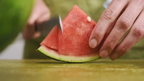 The chef cuts a watermelon. Stock Footage 209930373