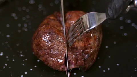 Chef cutting beef steak. Slow motion. Stock-Footage 303745142