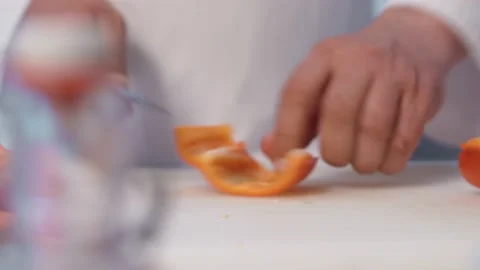 The chef cutting bell pepper. Stock Footage 154490834
