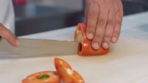 The chef cutting bell pepper. Stock Footage 154492631