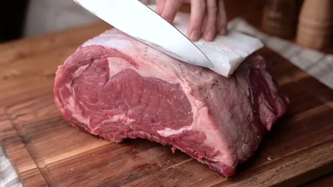 Chef cutting block of ribeye beef steak, slow motion 4k 120p	 Stock Footage 157991853