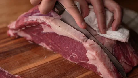 Chef cutting block of ribeye beef steak, slow motion 4k 120p	 Stock Footage 157992007