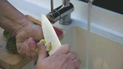 Chef Cutting Broccoli Video stock 125982359