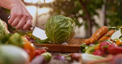 Chef cutting cabbage with knife Stock Footage 311833023