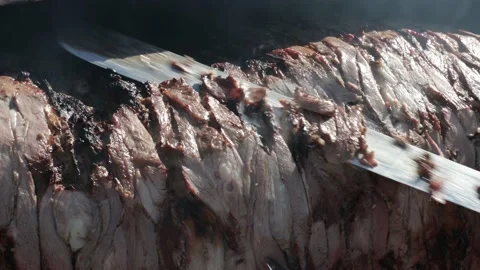 Chef is cutting cag kebab with knife Video stock 224677581