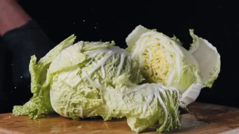 Chef cutting Chinese cabbage. Stock Footage 140488995