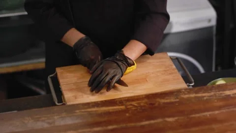 Chef is cutting corn in the kitchen. Close up Stock Footage 131152074