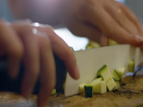 Chef Cutting Courgette On A Cutting Board 4K Stock Footage 79448284