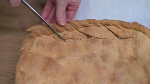Chef cutting diagonal lines on top of baked dough 스톡 동영상 304980791