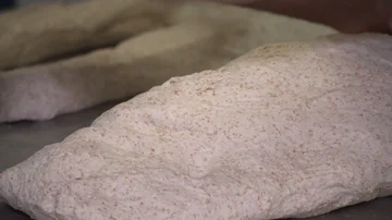 Chef cutting dough into strips  Stock Footage 85903618