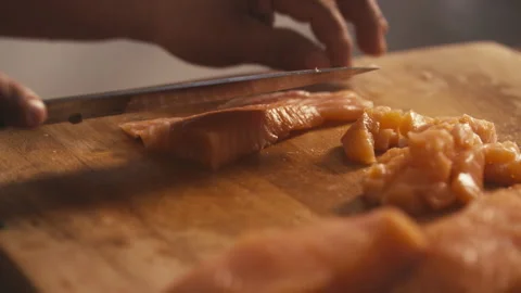 Chef cutting fish on cutting board Stock Footage 274619118