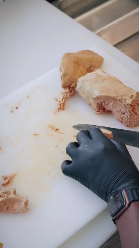 Chef cutting foie gras overhead 4k vertical Stock Footage 317456844