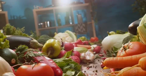 Chef cutting fresh green celery on wooden board surrounded by colorful orga.. Stock Footage 337443459