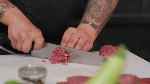 Chef cutting fresh meat raw lunch condiment preparation beef board cooking food Stock Footage 103289835