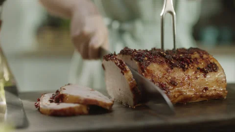 Chef Cutting Fried Spiced Meat on Kitchen Board Stock Footage 159328863