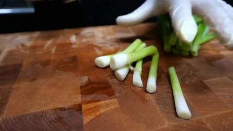 The chef is cutting green onions Stock Footage 171870624