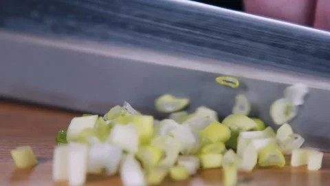 Chef cutting green onions macro shoot. Stock Footage 140489060