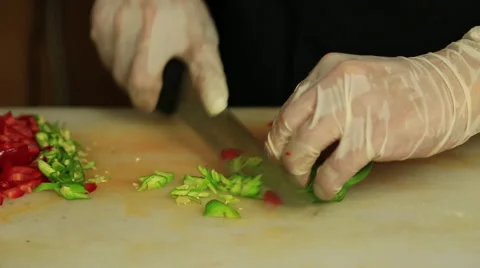 A Chef Is Cutting Green Pepper Stock Footage 65481328