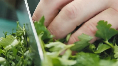 Chef cutting greens Stock Footage 114162737