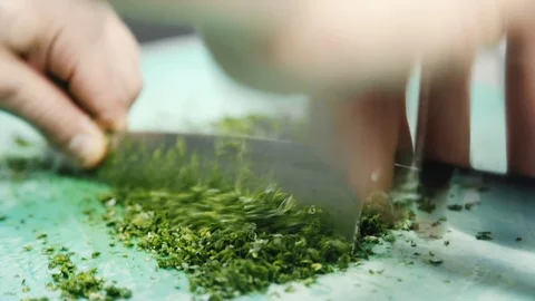 Chef cutting greens Stock Footage 114162742