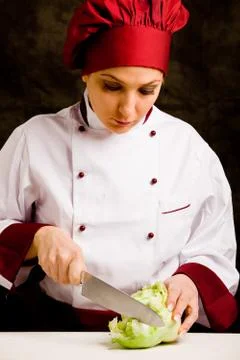 Chef cutting lettuce Stock Photos