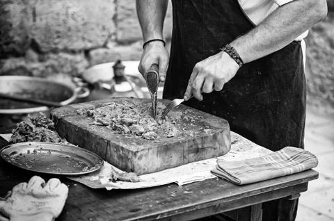 Chef cutting meat Stock Photos