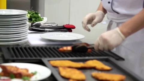 Chef cutting the meat into pieces Stock Footage 72287442