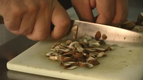 Chef cutting mushrooms Stock Footage 90732343