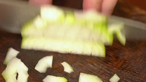 Chef cutting the onion at cutting board. Stock Footage 250441748