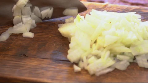 Chef cutting the onion at cutting board. High quality 4k footage Stock Footage 251649322