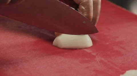 Chef cutting onion finely, close up Stock Footage 66062280