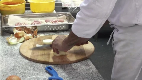 Chef cutting onion Stock Footage 74364466
