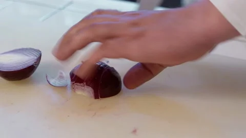 The chef cutting onion using. Stock Footage 154493320