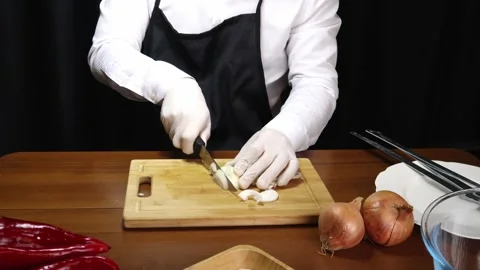 Chef is cutting onions 스톡 동영상 190073092