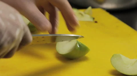 Chef cutting out apple seeds, close up Video stock 66075979