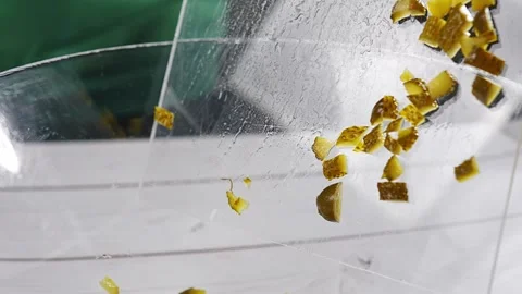 Chef cutting pickled cucumbers on glass cutting board Stock Footage 291679609