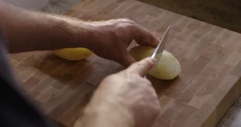 Chef Cutting Potatoes 스톡 동영상 105370796