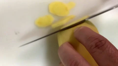 A Chef cutting potatoes quickly. Conept of chopping food and chips. Stock Footage 133714680