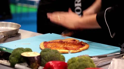 Chef cutting prepared pizza Stock Footage 58799481