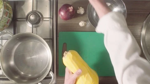 Chef cutting pumpkin on chopping board Video stock 88609295