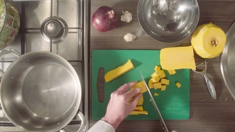 Chef cutting pumpkin on chopping board Video stock 88609557