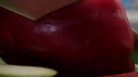 Chef is cutting red bell pepper Stock Footage 153747291