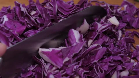 Chef cutting red cabbage with knife 4k Stock Footage 149618837