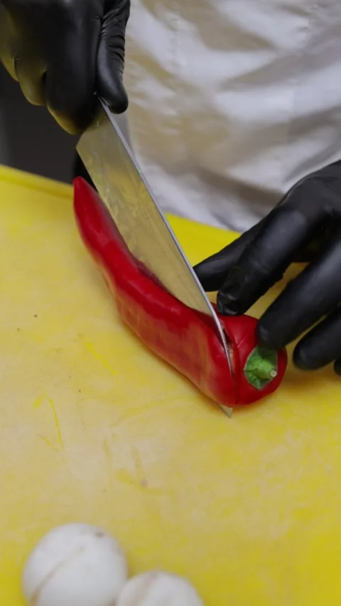 Chef cutting red chili pepper Stock Footage 326895335