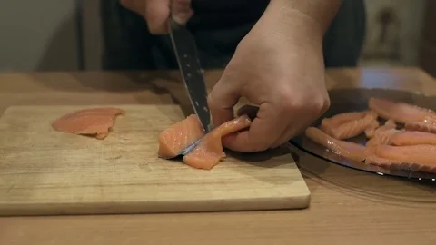 Chef cutting the salmon, cut the salmon, cutting fish by knife, Appetizing Stock Footage 69787531