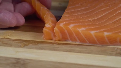 Chef cutting the salmon fillet  Stock Footage 125422447