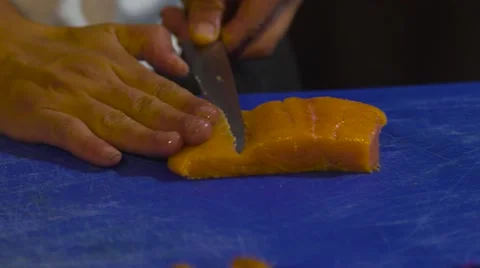 Chef cutting slices of salmon fish Video stock 66755044