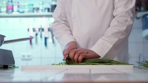 The chef cutting spring onion. Stock Footage 154494360